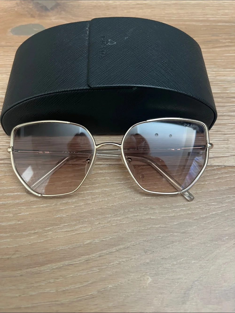 Prada Cat Eye Gold Frame Sunglasses with Brown Gradient Lenses